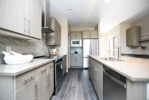 The kitchen area in a spacious, open-concept home on Willow Creek Road in Bridgwater Trails in Winnipeg on Monday, Aug. 24, 2015.   Mikaela MacKenzie / Winnipeg Free Press
