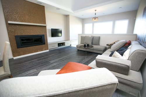 The living room area in a spacious, open-concept home on Willow Creek Road in Bridgwater Trails in Winnipeg on Monday, Aug. 24, 2015.   Mikaela MacKenzie / Winnipeg Free Press