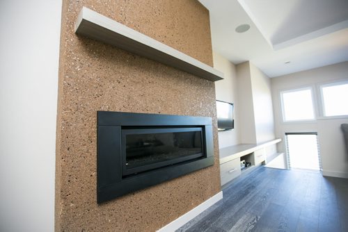 The unique fireplace in a spacious, open-concept home on Willow Creek Road in Bridgwater Trails in Winnipeg on Monday, Aug. 24, 2015.   Mikaela MacKenzie / Winnipeg Free Press