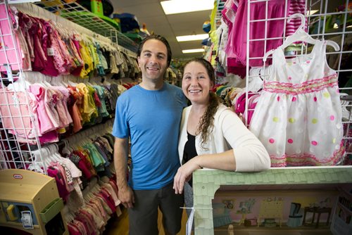 Christina and Dave Dunlop, owners of the new Once Upon a Child consignment store for children in Winnipeg on Tuesday, Aug. 25, 2015.   Mikaela MacKenzie / Winnipeg Free Press