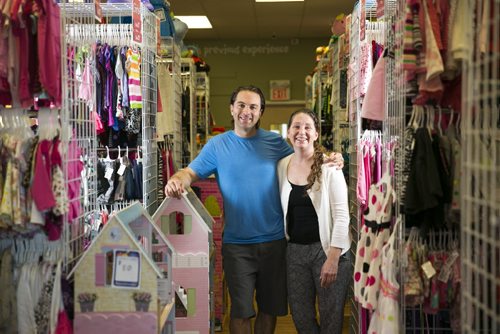 Christina and Dave Dunlop, owners of the new Once Upon a Child consignment store for children in Winnipeg on Tuesday, Aug. 25, 2015.   Mikaela MacKenzie / Winnipeg Free Press