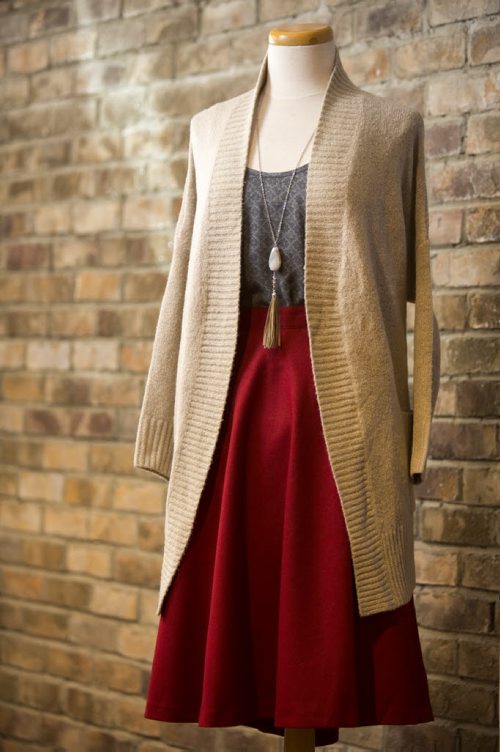 Cardigans and fall outfits are displayed at Out of the Blue in Osborne in Winnipeg on Tuesday, Aug. 25, 2015.   Mikaela MacKenzie / Winnipeg Free Press