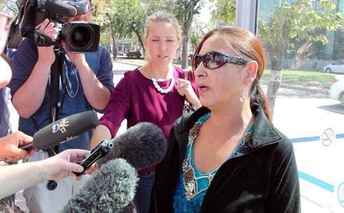 Convicted killer Traigo Andretti has just pleaded guilty to 2006 cold case murder of Winnipeg woman Myrna Letandre. Lorna Sinclair, Myrna's sister, talks to the media. BORIS MINKEVICH / WINNIPEG FREE PRESS PHOTO August 25, 2015