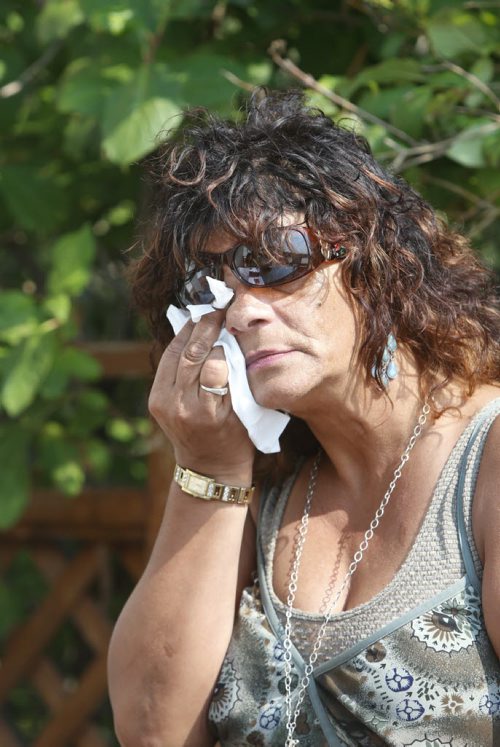 WARNING THERE MAY BE A COURT ORDER NOT TO IDENTIFY THE VICTIM. Jamie Bourne mother  of Brett Bourne, the teen who was killed at Kelvin in June wipes away tears. Jessica Botelho-Urbanski story Wayne Glowacki / Winnipeg Free Press August 26   2015