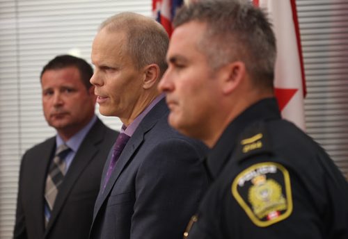 L to R- Acting Inspector Gene Bowers Winnipeg Police Service Counter Exploitation Unit ( CEU) with Cam MacKid of CEU and Constable Jason Michalyshen speak of charges from Project Create- a initiative to combat the sex trade in Winnipeg- see story- Aug 27, 2015   (JOE BRYKSA / WINNIPEG FREE PRESS)