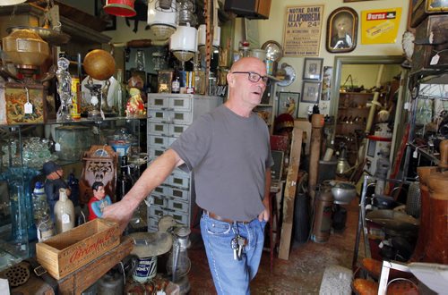Carberry, MB. - Antique shop owner Joe Harding chats to Bart on election boundary changes. BORIS MINKEVICH / WINNIPEG FREE PRESS PHOTO August 27, 2015
