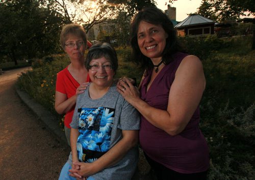 Donna Harris (center), president of Humanist, Atheists and Agnostics of Manitoba and conference organizers Doroathy Stephens (left) and Sherry Marginet (right) See Suderman's story. August 27, 2015 - (Phil Hossack / Winnipeg Free Press)