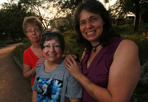 Donna Harris (center), president of Humanist, Atheists and Agnostics of Manitoba and conference organizers Doroathy Stephens (left) and Sherry Marginet (right) See Suderman's story. August 27, 2015 - (Phil Hossack / Winnipeg Free Press)