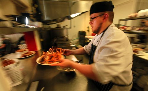 DIner's Grill owner and Chef Joshua Mesojednikseves up hearty chow at his St Boniface Industrial Park eatery.  See Dave Sanderson story.  Sept 3, 2015 - (Phil Hossack / Winnipeg Free Press)