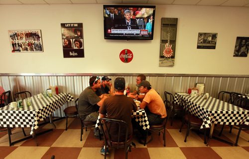 DIner's Grill customers focus on the chow at the St Boniface Industrial Park eatery, not politics.  See Dave Sanderson story.  Sept 3, 2015 - (Phil Hossack / Winnipeg Free Press)