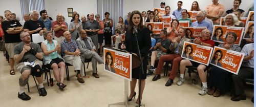 Provincial MLA Erin Selby at the podium to  announce Friday morning she will be the federal NDP candidate in St. Boniface-St. Vital. to an exuberant crowd at the Glenwood Community Centre .¤Larry Kusch / Nick Martin stories Wayne Glowacki / Winnipeg Free Press Sept.4  2015