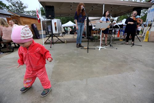 Taisiya, 19mo, dancing at the St.Norbert Farmers Market, Saturday, September 5, 2015. (TREVOR HAGAN/WINNIPEG FREE PRESS)