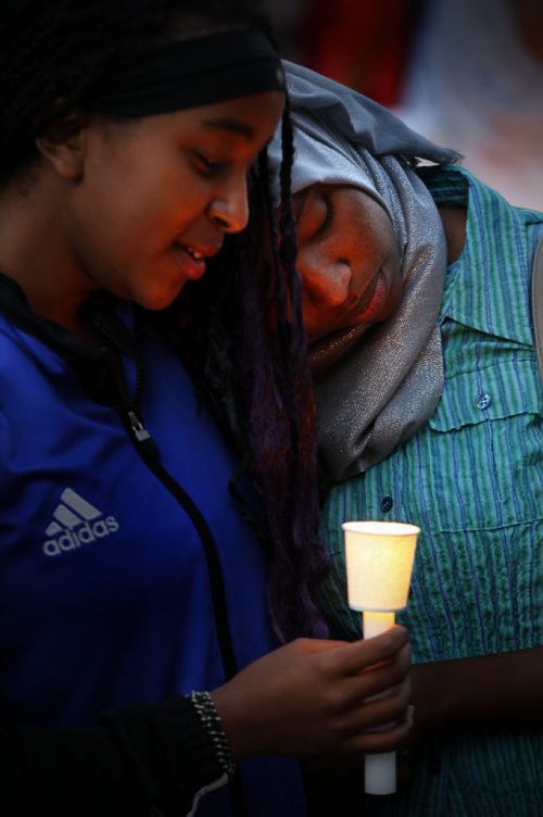 September 6, 2015 - 150906 -  People gathered at Winnipeg's city hall for a demonstration and a vigil for dead and missing refugees Sunday, September 6, 2015. John Woods / Winnipeg Free Press