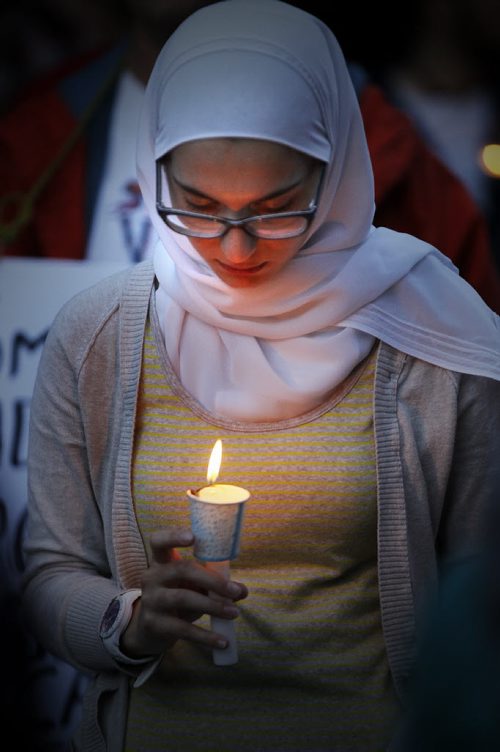 September 6, 2015 - 150906 -  People gathered at Winnipeg's city hall for a demonstration and a vigil for dead and missing refugees Sunday, September 6, 2015. John Woods / Winnipeg Free Press