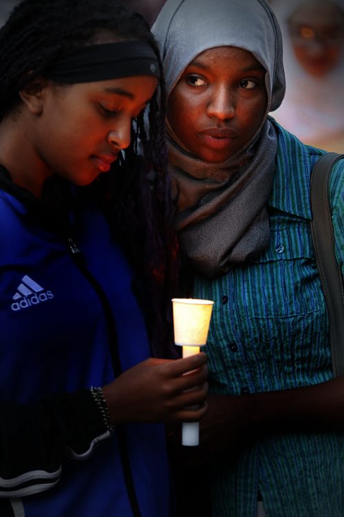 September 6, 2015 - 150906 -  People gathered at Winnipeg's city hall for a demonstration and a vigil for dead and missing refugees Sunday, September 6, 2015. John Woods / Winnipeg Free Press