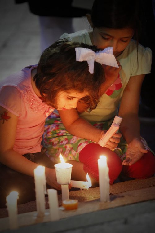 September 6, 2015 - 150906 -  People gathered at Winnipeg's city hall for a demonstration and a vigil for dead and missing refugees Sunday, September 6, 2015. John Woods / Winnipeg Free Press