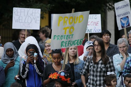 September 6, 2015 - 150906 -  People gathered at Winnipeg's city hall for a demonstration and a vigil for dead and missing refugees Sunday, September 6, 2015. John Woods / Winnipeg Free Press