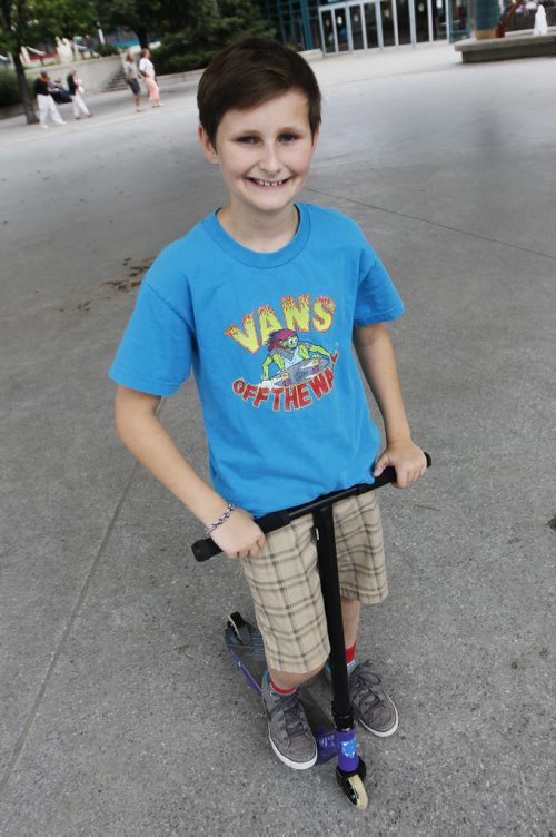 September 7, 2015 - 150907 - Callun Madden, 11, who is heading back to school Wednesday, was hanging out at The Forks Monday, September 7, 2015. John Woods / Winnipeg Free Press