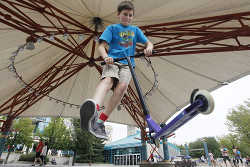 September 7, 2015 - 150907 - Callun Madden, 11, who is heading back to school Wednesday, was hanging out at The Forks Monday, September 7, 2015. John Woods / Winnipeg Free Press