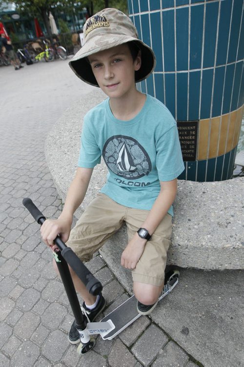 September 7, 2015 - 150907 - Sheamus Madden, 14, who is heading back to school Wednesday, was hanging out at The Forks Monday, September 7, 2015. John Woods / Winnipeg Free Press