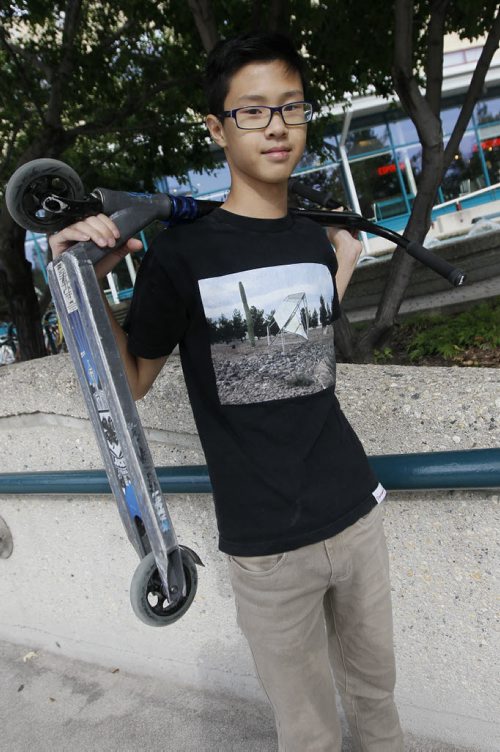 September 7, 2015 - 150907 - Aaron Nguyen, 14, who is heading back to school Wednesday, was hanging out at The Forks Monday, September 7, 2015. John Woods / Winnipeg Free Press