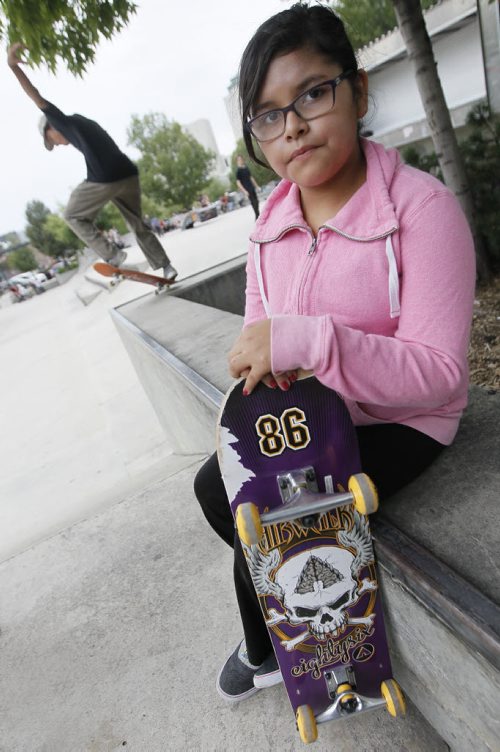 September 7, 2015 - 150907 - Shanice Keno, 10, who is heading back to school Wednesday, was hanging out at The Forks Monday, September 7, 2015. John Woods / Winnipeg Free Press