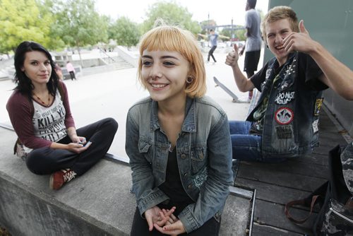 September 7, 2015 - 150907 - Hannah Spence, 14, with her friends Mason Jensen and Kirsten Schreck, is heading back to school Wednesday, and was hanging out at The Forks Monday, September 7, 2015. John Woods / Winnipeg Free Press