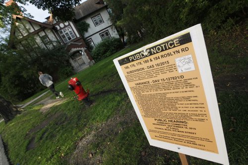 September 7, 2015 - 150907 - 166 - 184 Roslyn Road is undergoing a zoning variance as seen Monday, September 7, 2015. The proposal is to consolidate four residential properties to allow for the construction of a 78 multi-family unit. John Woods / Winnipeg Free Press