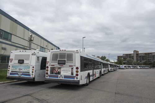 DAVID LIPNOWSKI / WINNIPEG FREE PRESS September 10, 2015 150910  Winnipeg Transit Buses parked at the Osbourne yard Thursday September 10, 2015.