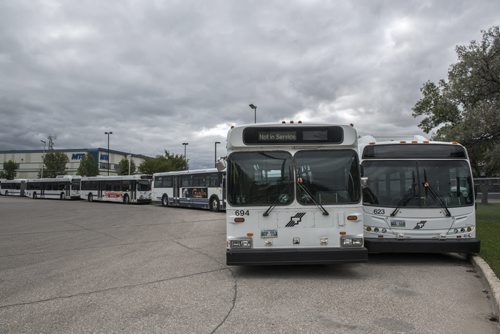 DAVID LIPNOWSKI / WINNIPEG FREE PRESS September 10, 2015 150910  Winnipeg Transit Buses parked at the Osbourne yard Thursday September 10, 2015.