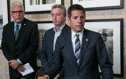 Mayor Brian Bowman (right), Dave Wardrop (centre), Director Winnipeg Transit, and Doug McNeil (left), Chief Administrative Officer, during a press conference at City Hall regarding the Winnipeg Transit bus shortage. 150910 - Thursday, September 10, 2015 -  MIKE DEAL / WINNIPEG FREE PRESS
