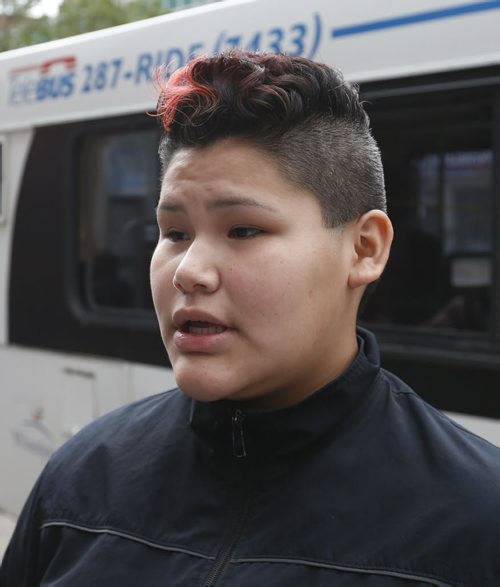 Kori-lynn Hardisty gets off her bus at the bus stop on Portage Ave. at Donald Thursday. Winnipeggers will have to get used to a reduced level of Transit service as the department struggles with a manpower shortage and problematic buses.Ashley Prest story Wayne Glowacki / Winnipeg Free Press September 10 2015