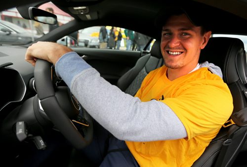 Winnipeg Jets' Mark Sheifele eagerly waits for his chance to drive an Audi TT around the Gimli Motorsports Park, during a fundraising event for KidSport Winnipeg, Thursday, September 10, 2015. (TREVOR HAGAN/WINNIPEG FREE PRESS)