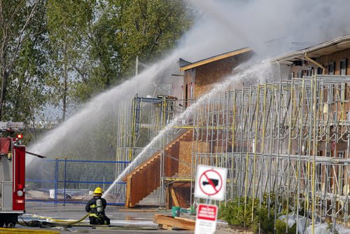 Fire scene at Super 8 that was under construction on Furmor. BORIS MINKEVICH / WINNIPEG FREE PRESS PHOTO Sept. 11, 2015