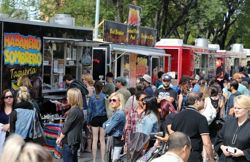 Crowds line up for food trucks at Manyfest on Broadway on Sept. 12, 2015. Photo by Jason Halstead/Winnipeg Free Press