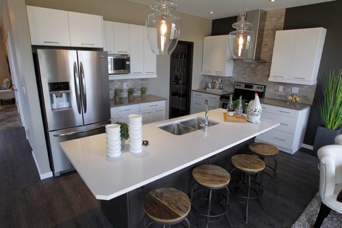 HOMES - 71 John Pelland Road in Sage Creek. Kitchen island. Kensington Homes Rene Giroux. BORIS MINKEVICH / WINNIPEG FREE PRESS PHOTO Sept. 14, 2015