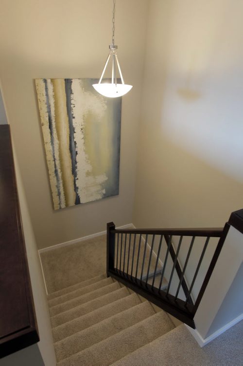 HOMES - 71 John Pelland Road in Sage Creek. Kensington Homes Rene Giroux. Staircase feature. BORIS MINKEVICH / WINNIPEG FREE PRESS PHOTO Sept. 14, 2015