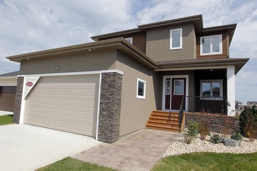 HOMES - 71 John Pelland Road in Sage Creek. Kensington Homes Rene Giroux. Front of home. BORIS MINKEVICH / WINNIPEG FREE PRESS PHOTO Sept. 14, 2015