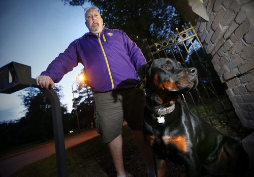 September 14, 2015 - 150914  -  Daren Jorgensen and his Rottweiler Gunter photographed outside his home Monday, September 14, 2015. Jorgensen and are tired of the  crime in his neighbourhood and have started local patrols. John Woods / Winnipeg Free Press