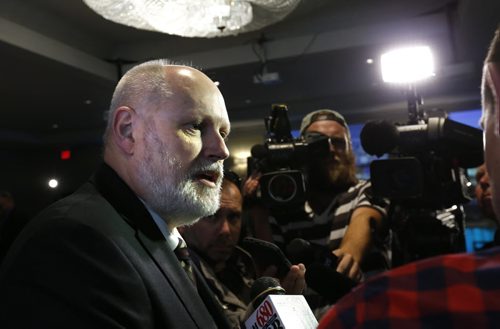 Rocky Wiggins, CIO WestJet with media after he announced cheap flights from Winnipeg to London Gatwick. The event Tuesday was held in the Fairmont Hotel. Bart Kives story.  Wayne Glowacki / Winnipeg Free Press September 15 2015