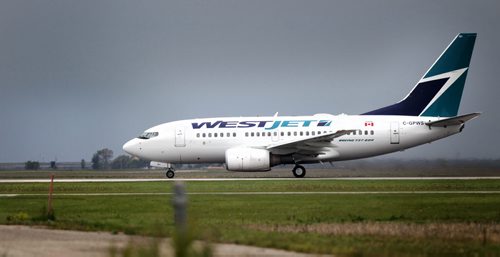 WestJet Boeings taxi and take off at Winnipeg's James Richardson Airport Tuesday. They will start flying direct to London England. September 15, 2015 - (Phil Hossack / Winnipeg Free Press)