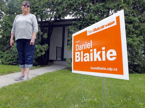 George Suttie Bay resident Jean Shewchuk is proud to have a NDP Daniel Blaikie sign on her lawn.  BORIS MINKEVICH / WINNIPEG FREE PRESS PHOTO Sept. 15, 2015