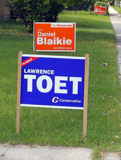 NDP Daniel Blaikie and Lawrence Toet signs all over elmwood transcona area. These are right Regent Ave. BORIS MINKEVICH / WINNIPEG FREE PRESS PHOTO Sept. 15, 2015