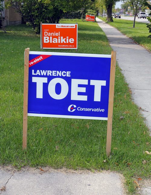NDP Daniel Blaikie and Lawrence Toet signs all over elmwood transcona area. These are right Regent Ave. BORIS MINKEVICH / WINNIPEG FREE PRESS PHOTO Sept. 15, 2015