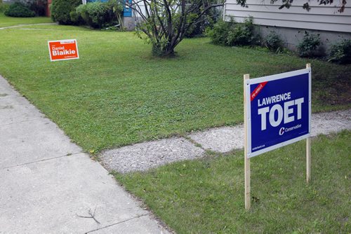 NDP Daniel Blaikie and Lawrence Toet signs in Transcona. Robert Regula on Harvard Ave. East lets both of his choices on his lawn, but will only choose on election day. BORIS MINKEVICH / WINNIPEG FREE PRESS PHOTO Sept. 15, 2015