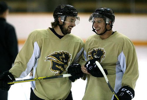 Brett Stovin, left, and Warren Callis, during University of Manitoba Bisons' hockey practice at Wayne Fleming Arena, Tuesday, September 15, 2015. (TREVOR HAGAN/WINNIPEG FREE PRESS)