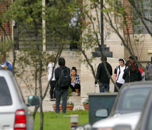 Police and Fire at Tec Voc high school where there was a possible pepper spray incident. EDS NOTE: photographed students from street. BORIS MINKEVICH / WINNIPEG FREE PRESS PHOTO Sept. 16, 2015