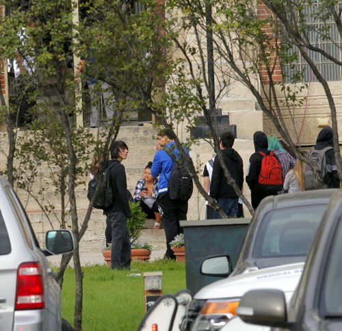 Police and Fire at Tec Voc high school where there was a possible pepper spray incident. EDS NOTE: photographed students from street. BORIS MINKEVICH / WINNIPEG FREE PRESS PHOTO Sept. 16, 2015