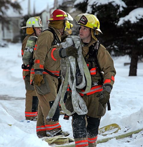 BORIS MINKEVICH / WINNIPEG FREE PRESS  071223 Firefighters at the scene of the fire at 812 Clifton.