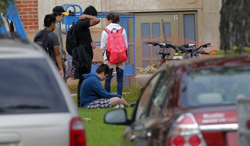 Police and Fire at Tec Voc high school where there was a possible pepper spray incident. EDS NOTE: photographed students from street. BORIS MINKEVICH / WINNIPEG FREE PRESS PHOTO Sept. 16, 2015